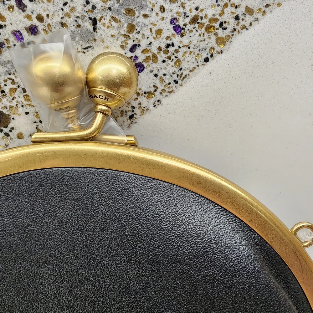 Coach Black Round Crossbody with Gold Frame